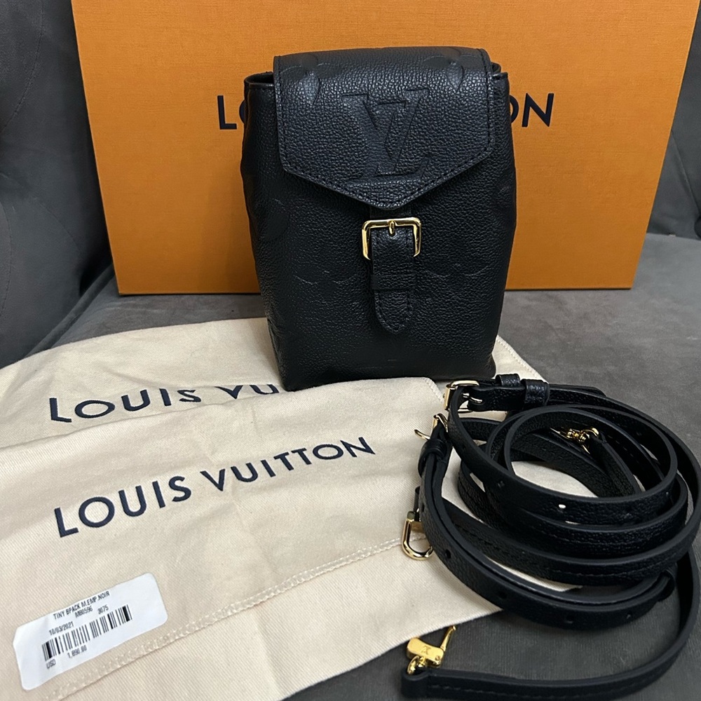Authentic Louis Vuitton tiny backpack in black.